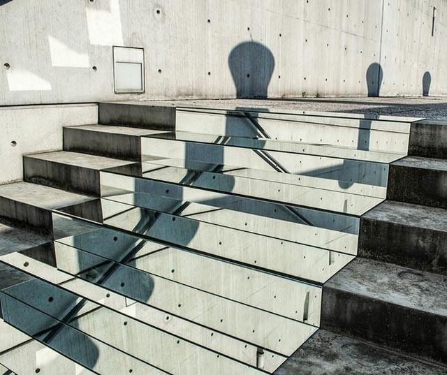 Mirrors-installed-on-stairs-make-it-appear-you’re-walking-amongst-the-clouds4-650x545