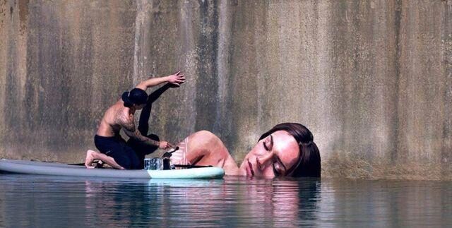 Artist-paints-giant-murals-of-women-bathing-i