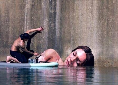 Artist-paints-giant-murals-of-women-bathing-i