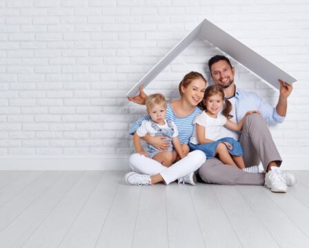 concept housing a young family. mother father and children in  new home